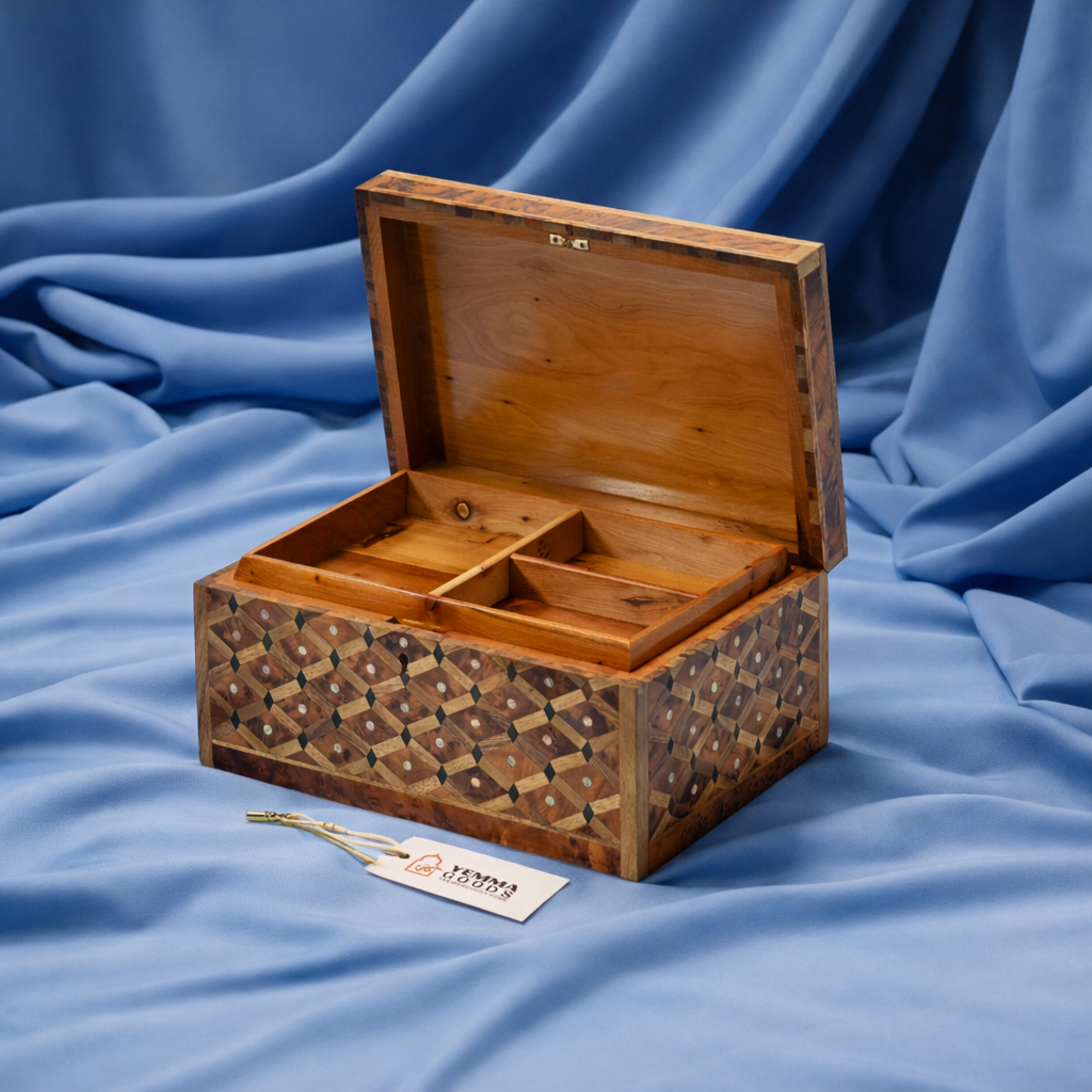 Wooden jewelry box with geometric pattern on a blue fabric background