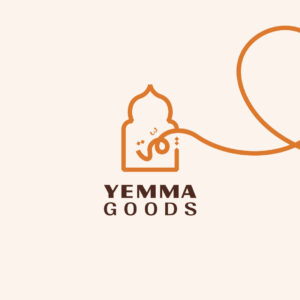 Yemma Goods Logo consists of a traditional moroccan door shape merged with the word Yemma written in arabic calligraphy, with the text "Yemma Goods" under the symbol