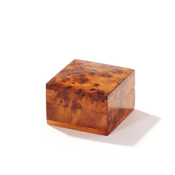 Wooden jewelry proposal ring box with a burl pattern on a white background