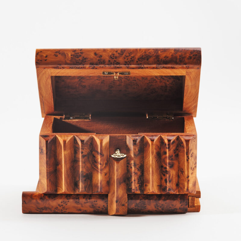 shot of open thuya wooden hidden keyhole secret box by yemma goods - lockable with hidden key