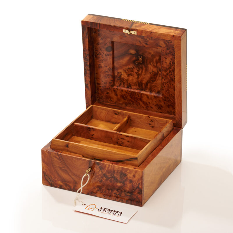 shot of open wide thuya wood keepsake box featuring a removable tray and lock with key